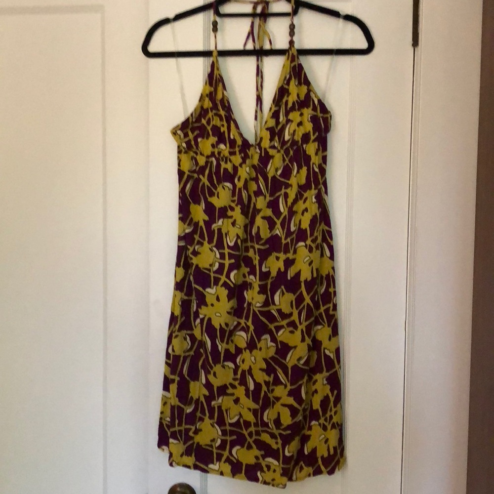 T-bags halter dress in purple and yellow print.